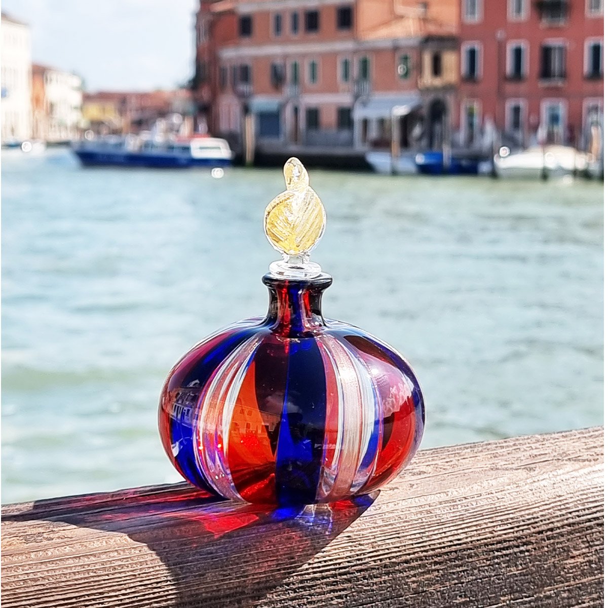 Blue and red online perfume bottle