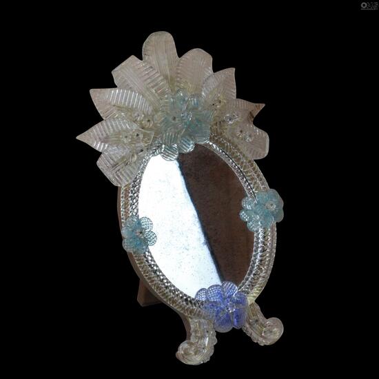 table_mirror_with_light_blue_flower.jpg.